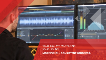 View of loudness and frequency analysis on two screens with analog outboard rack, DJ mix mastering at the Leipzig recording studio
